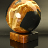 Симбирцитовый шар 100 мм на каменной подставке