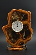 Часы на симбирцитовом спиле с фрагментами перламутра.
