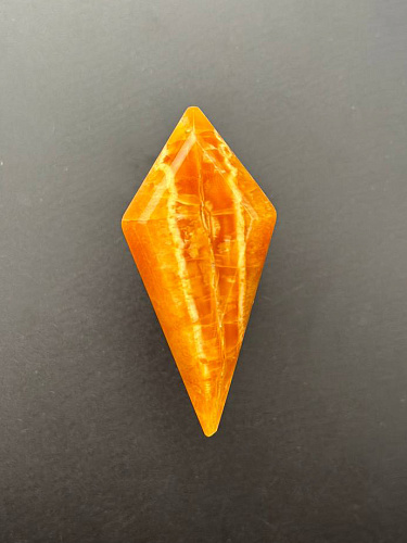 Симбирцитовый кабошон граненый 55х26 мм