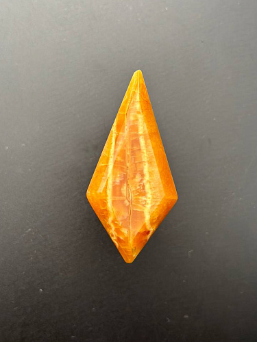 Симбирцитовый кабошон граненый 55х26 мм