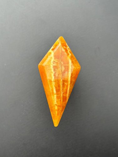 Симбирцитовый кабошон граненый 55х26 мм