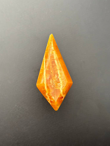 Симбирцитовый кабошон граненый 55х26 мм